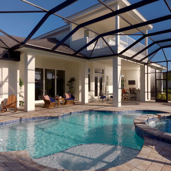 Pool and Spa At British West Indies Two Story By Custom Home Builder Camlin Custom Homes