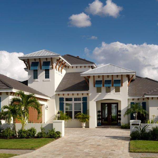 British West Indies At British West Indies Two Story By Custom Home Builder Camlin Custom Homes